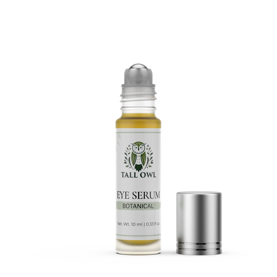 Tall Owl Botanical Eye Serum roller bottle with its cap off, showing the roller ball